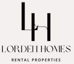 Private backyard of a Lorden Homes rental home with patio seating